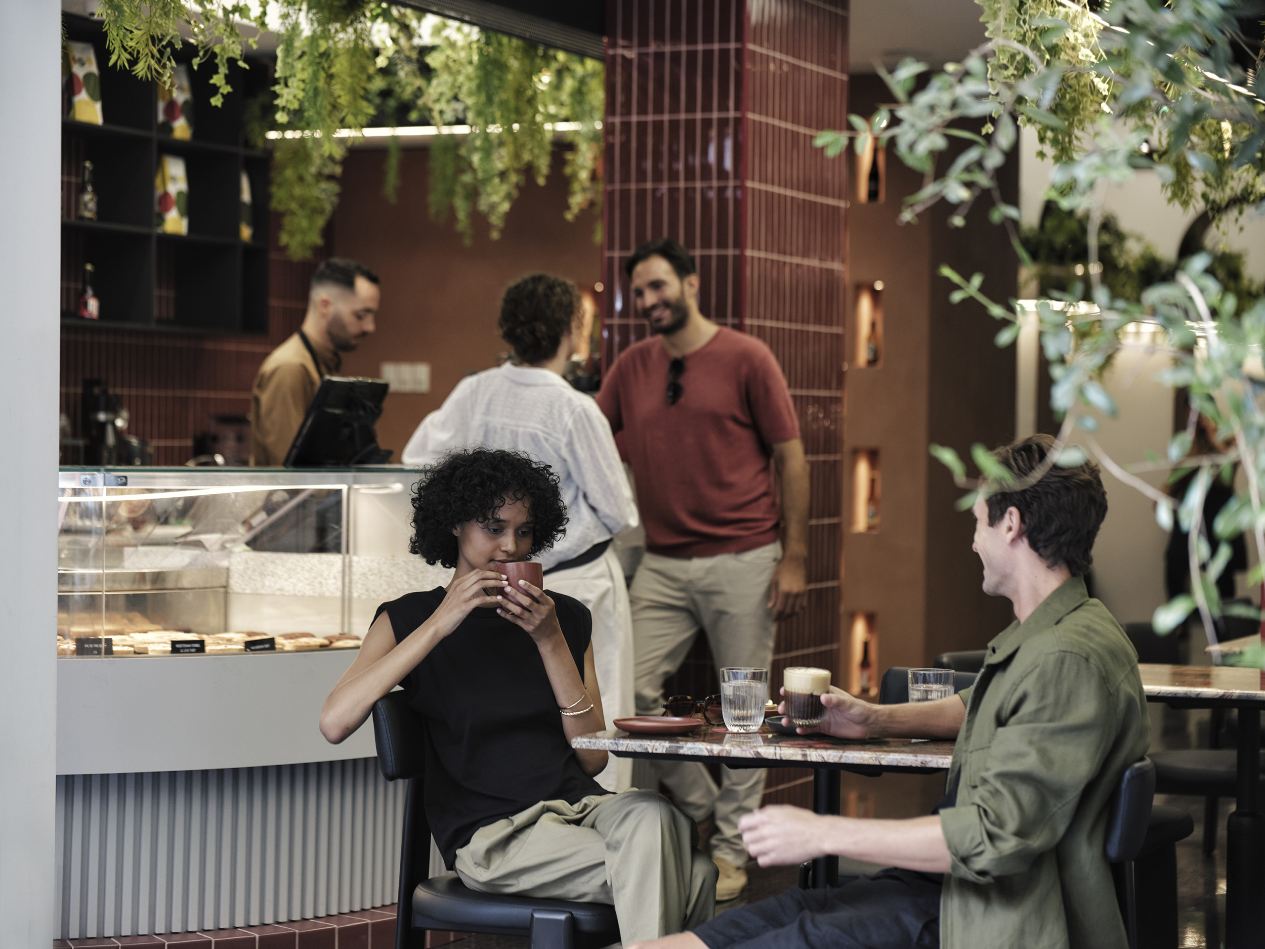 electra-rhythm-athens-rebels-brew-drinking-coffee