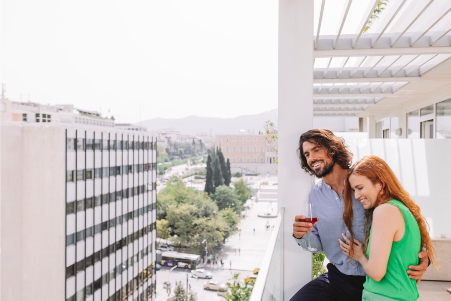 Electra_Hotel_Athens_Lifestyle_Couple_Balcony_-scaled-2