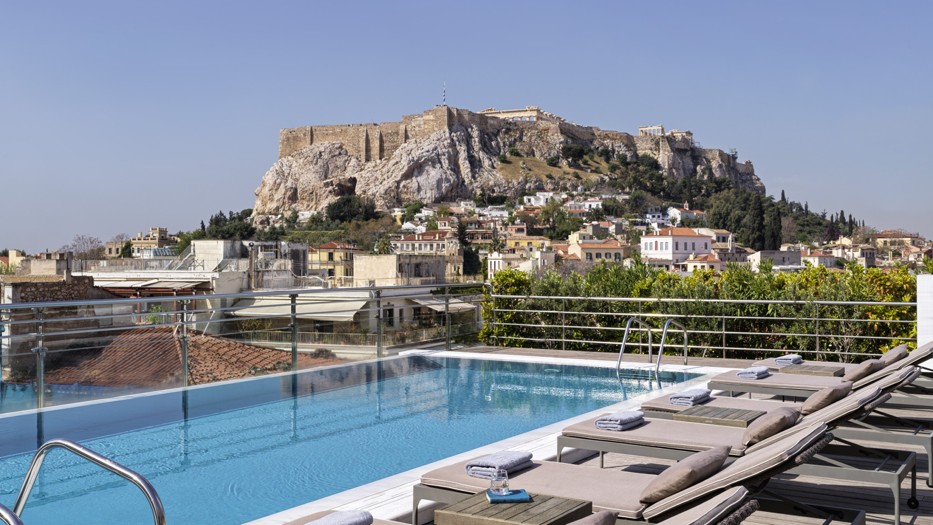 electra-palace-athens-outdoor-pool-sunbeds